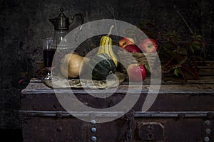 Still Life with pumpkin on wooden background