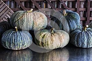 Still life pumpkins with wood background