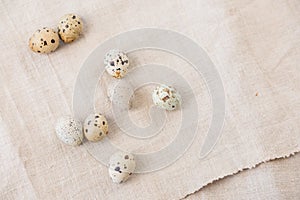 Still life. Quail eggs on a textile napkin. Rustic. Easter celebration concept