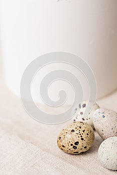 Still life. Quail eggs on a textile napkin. Rustic. Easter celebration concept