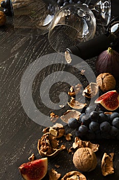 Still life with red wine and fruits