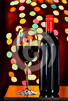 Still life, Red wine with glass and bokeh background, lowkey