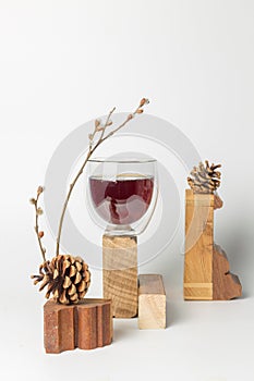 Still life with a refreshing drink with extracts of natural herbs, eleutherococcus, licorice, eucalyptus and essential