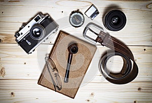 Still life with retro object on wood table.