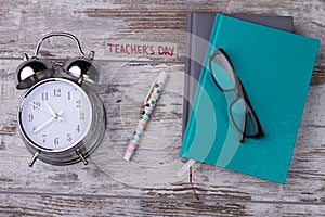 Still life of school items for happy teacher`s day.