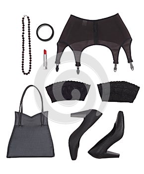 Still life of sexual woman. Overhead view of women's accessories in black tones.