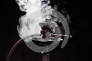 Still life shisha equipment and smoke