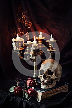 Still life with skull, book and candlestick