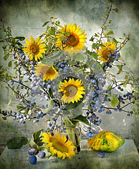 still life with a sloe and sunflowers