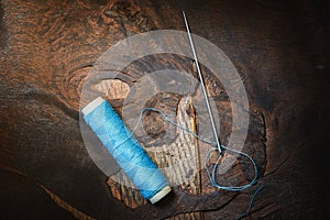 Still life- spool, thread, needle