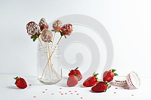 Still life of strawberries in chocolate