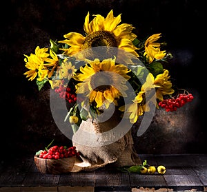 Still life with sunflowers in a vase
