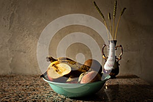 Still life of table with fruit in a plate