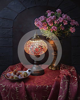 Still life with table lamp in Eastern style