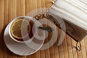 Still life, tea with lemon and napkins