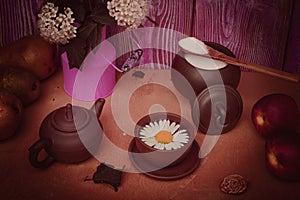 Still life - teapot for flower tea on a bright colored background.. High quality creative artwork clipart