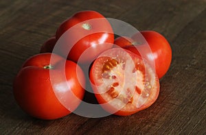 Still life of tomatoes on a table. photo