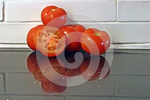 Still life of tomatoes on a table. photo