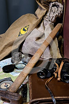 Still life with tools of a field geologist - field vintage geology concept