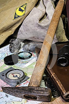 Still life with tools of a field geologist - field vintage geology concept