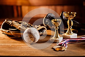 Still life of trophy, medals and vintage boxing gloves