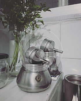 Still life with two steel coffee pots in kitchen