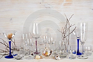 Still life of various glassware on wooden background