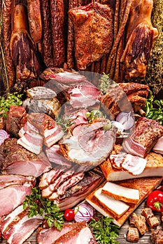 Still life of various smoked pork meat