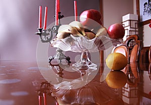 Still Life with Vase Antique Candelabras and fruits in interior