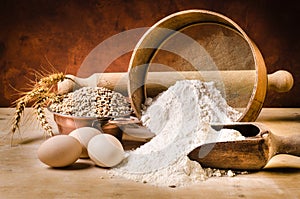 Still life. vintage kitchen utensils, flour and wheat