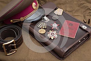 Still life with vintage objects dedicated to Victory Day. Medals and orders of Great Patriotic war.