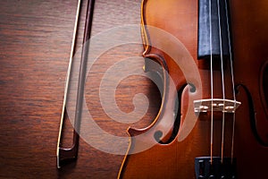 Still life violin on wood table.