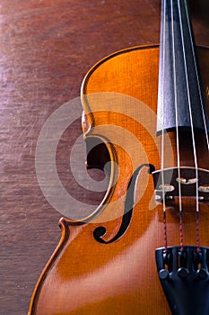 Still life violin on wood table.