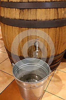 Still life with a water barrel