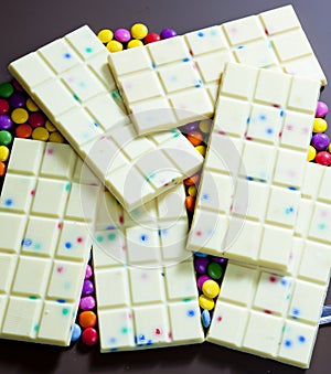 still life of white chocolate with smarties