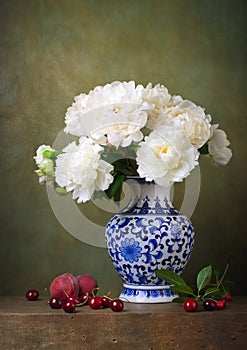 Still life with white peonies in a chinese vase