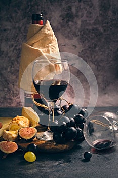 still life wine different cheeses and fruits