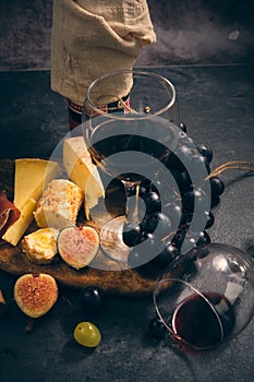 still life wine different cheeses and fruits