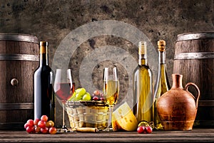 Still life with wine, grapes, barrels and cheese