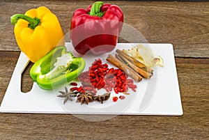 Still â€“ life concept sweet bell pepper (capsicum) and assorted spices for China Pharmaceutical Equipment