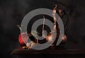 Stilllife with copper jug photo