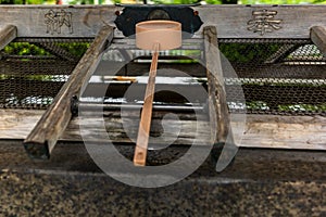 Stillness at the water basin at the entrance of a shrine in Japan for the riual Temizuya purification - 8