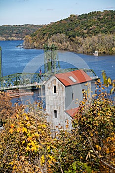 Stillwater, Minnesota in the fall - overlooking an old mill with fall leaves and the lift bridge on the St Croix River