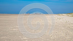 Stilt houses on the beach of Sankt Peter Ording