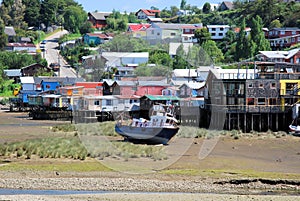Chiloe Island, Chile, Stilt houses colored Castro during low tide photo