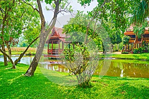 The stilt houses on the pond, Rajapruek park, Chiang Mai, Thailand
