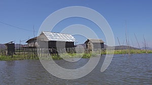 Stilted houses in village on famous Inle Lake