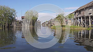 Stilted houses in village on famous Inle Lake