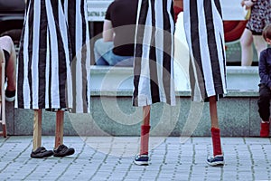 Stilts used by entertainers at a street festival