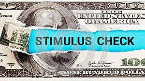 Stimulus Check. Torn bills revealing Stimulus Check words. Idea for USA check, Coronavirus affects US dollar, people